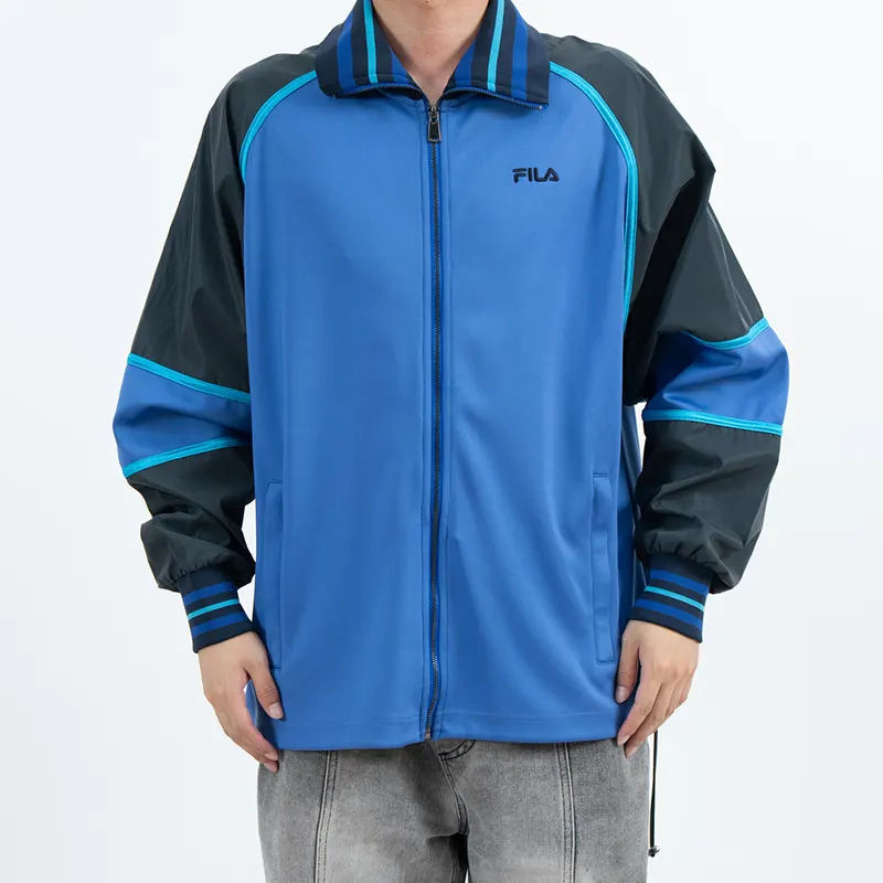 Blauw kleurblok outdoor hardshelljack met gestreepte kraag en manchetten